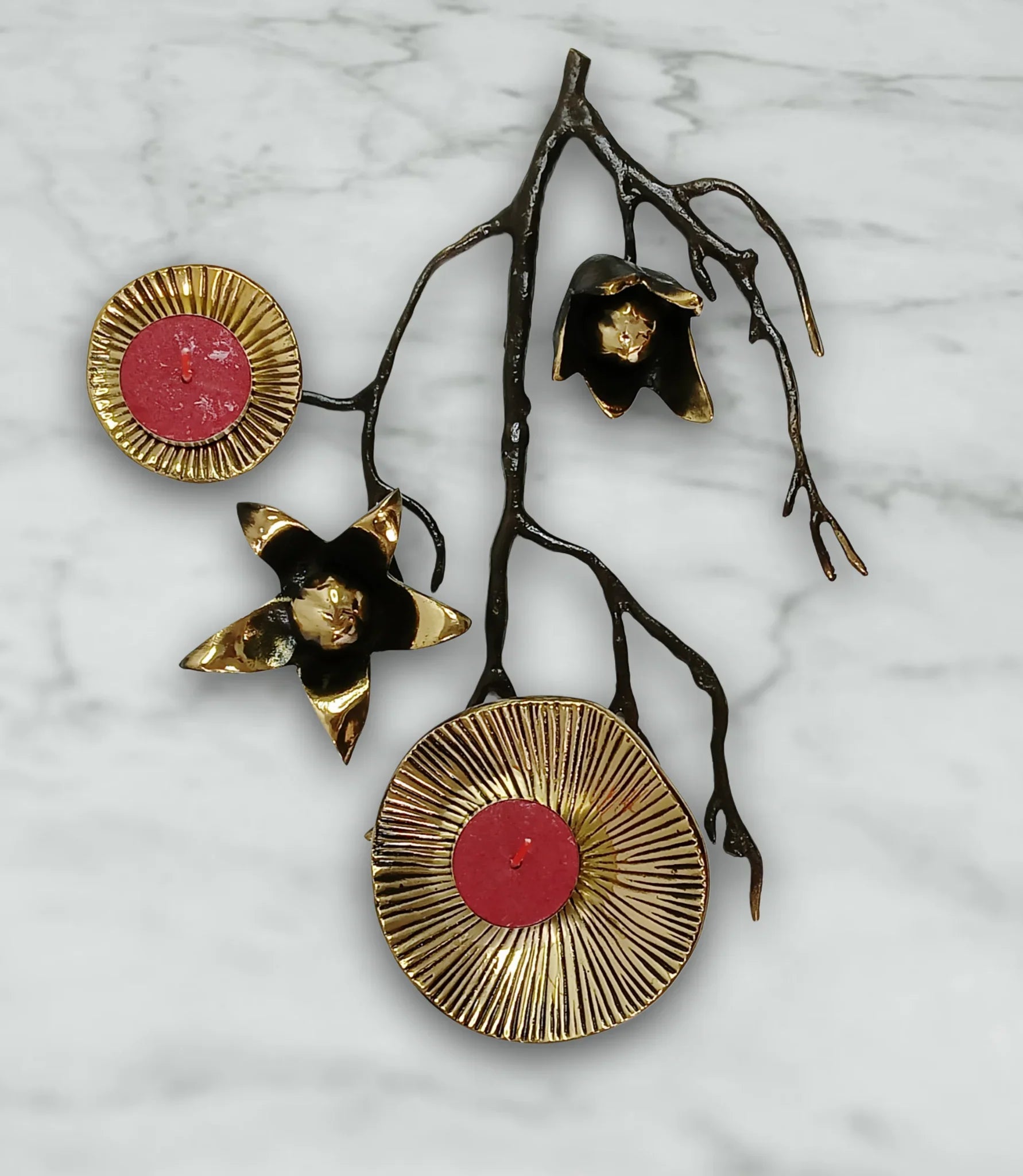 “brass flower tea light holder”