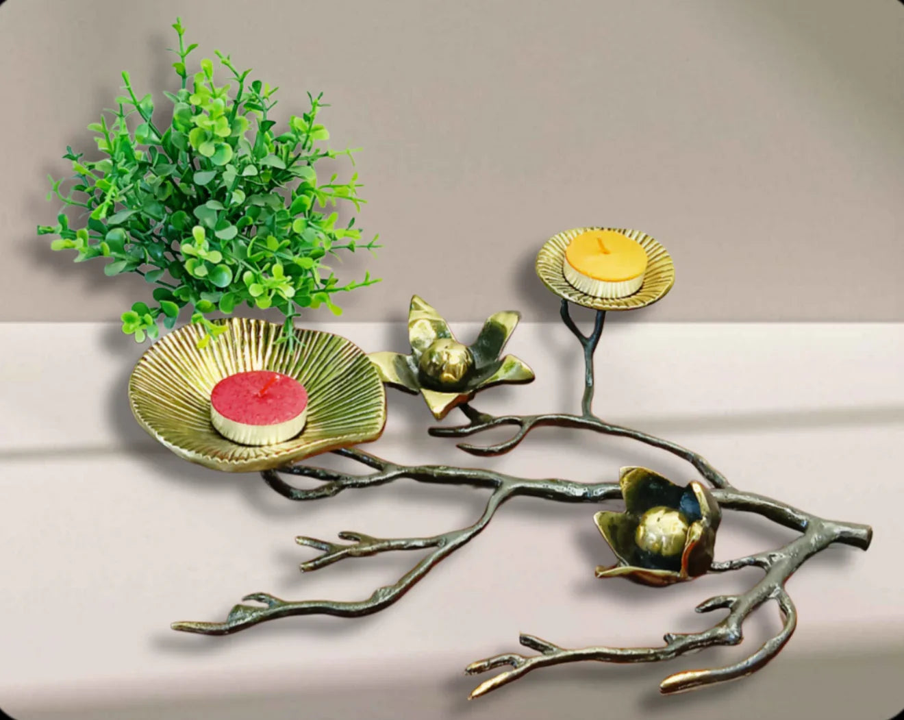 “brass flower tea light holder”