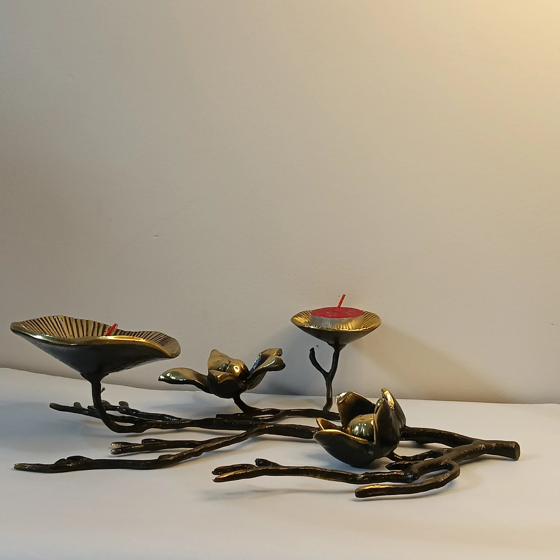 “brass flower tea light holder”