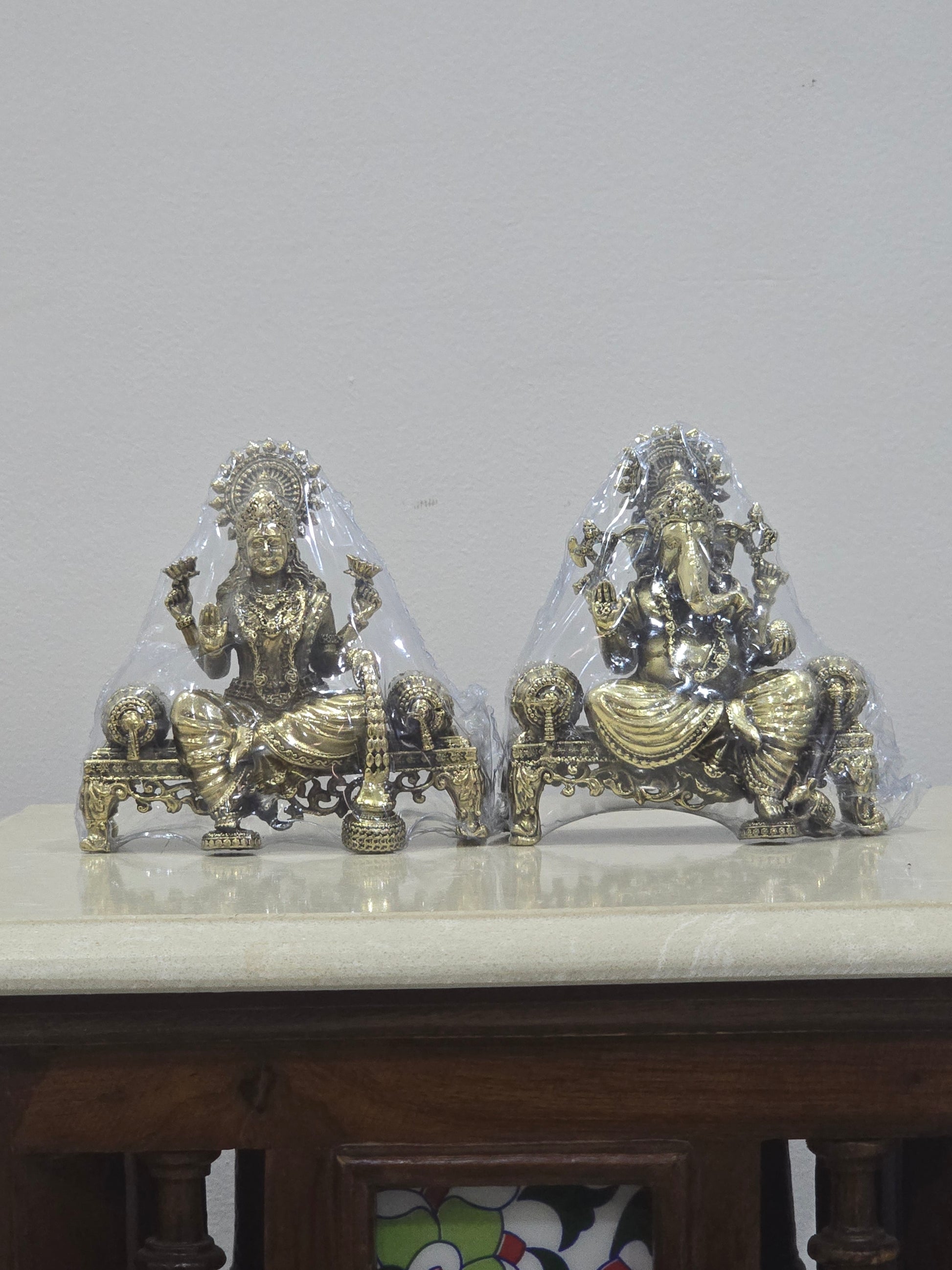 Lakshmi Ganesha Sitting On Singhasan Statue